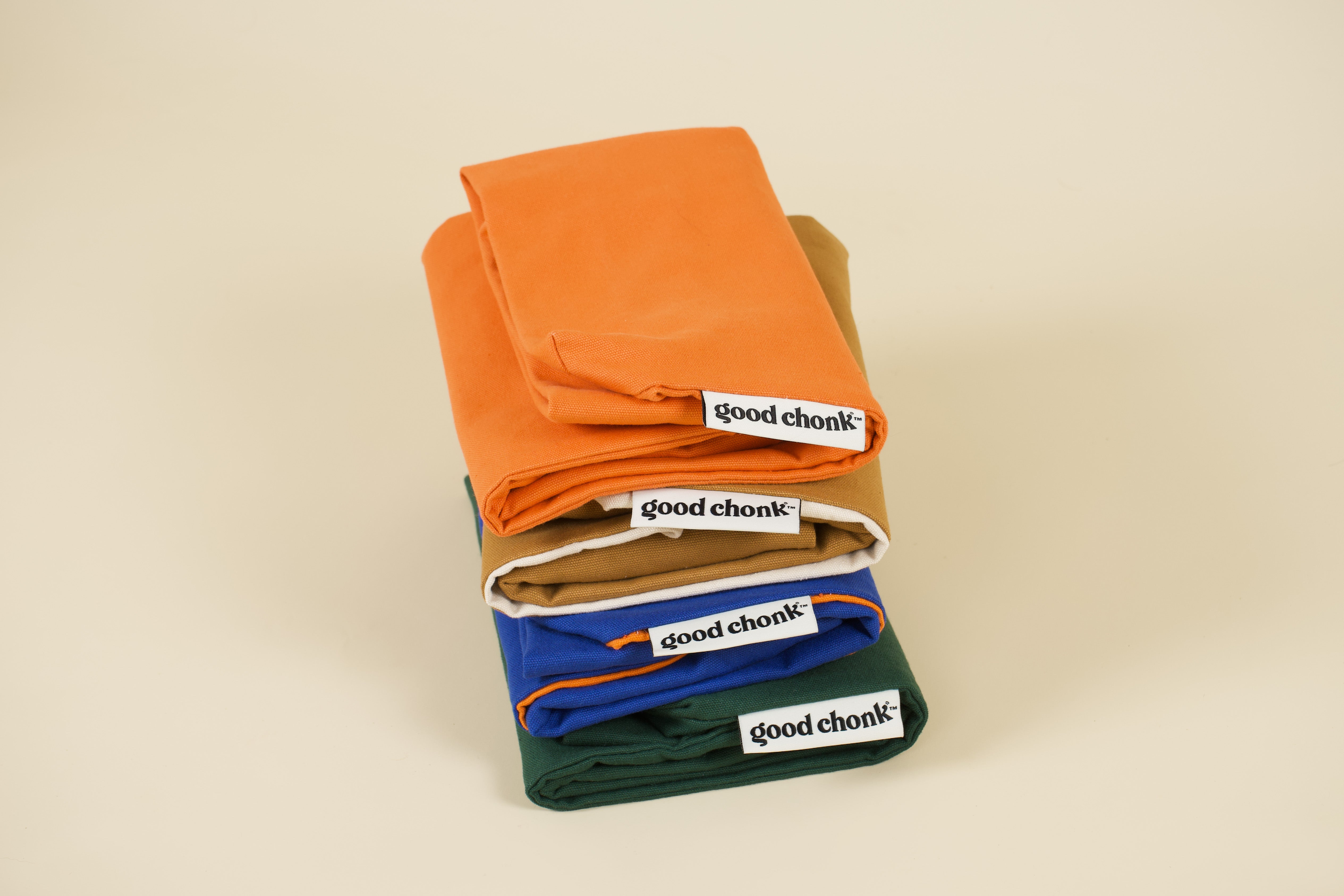 Stack of cotton canvas dog bed covers
